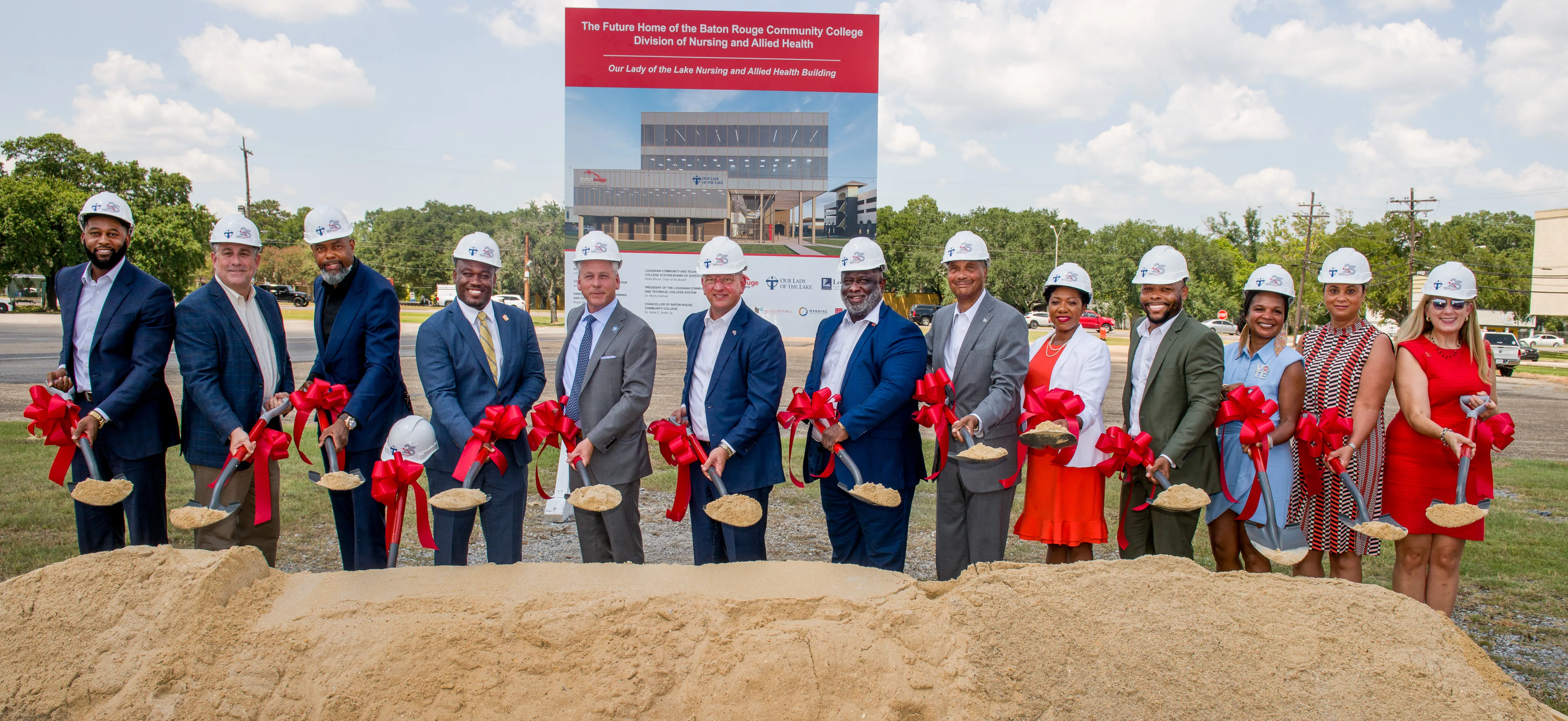  Representatives from Baton Rouge Community College and Our Lady of the Lake break ground on the new Nursing and Allied Health Building during a groundbreaking ceremony on the BRCC Mid City Campus on Thursday, Aug. 8, 2023. Pictured (l to r): Curry Allen, Director of Operations, Our Lady of the Lake Physician Group; Chris Haslitt, Architect, Chasm Architecture; Nathaniel Clark, Managing Partner, Chasm Architecture; Corlin LeBlanc, Vice Chancellor for Finance and Administration, BRCC; Dr. James E. Craven, President, Physician Group, Our Lady of the Lake; Governor John Bel Edwards; Dr. Willie E. Smith, Chancellor, BRCC; Alterman “Chip” Jackson, Vice Chair, Louisiana Community and Technical College System Board of Supervisors; Tina Schaffer, Vice President of Talent Strategy and Chief DEI Officer, Franciscan Missionaries of Our Lady Health System; James Hollins, Board member, Louisiana Community and Technical College System Board of Supervisors; Dr. Michelle Dennis, Dean, Division of Nursing and Allied Health, BRCC; Dr. Pamela Ravare-Jones, Vice Chancellor for Institutional Effectiveness and Strategic Initiatives, BRCC; and Dr. Pilar Blanco Eble, Vice Chancellor for Institutional Advancement, BRCC.