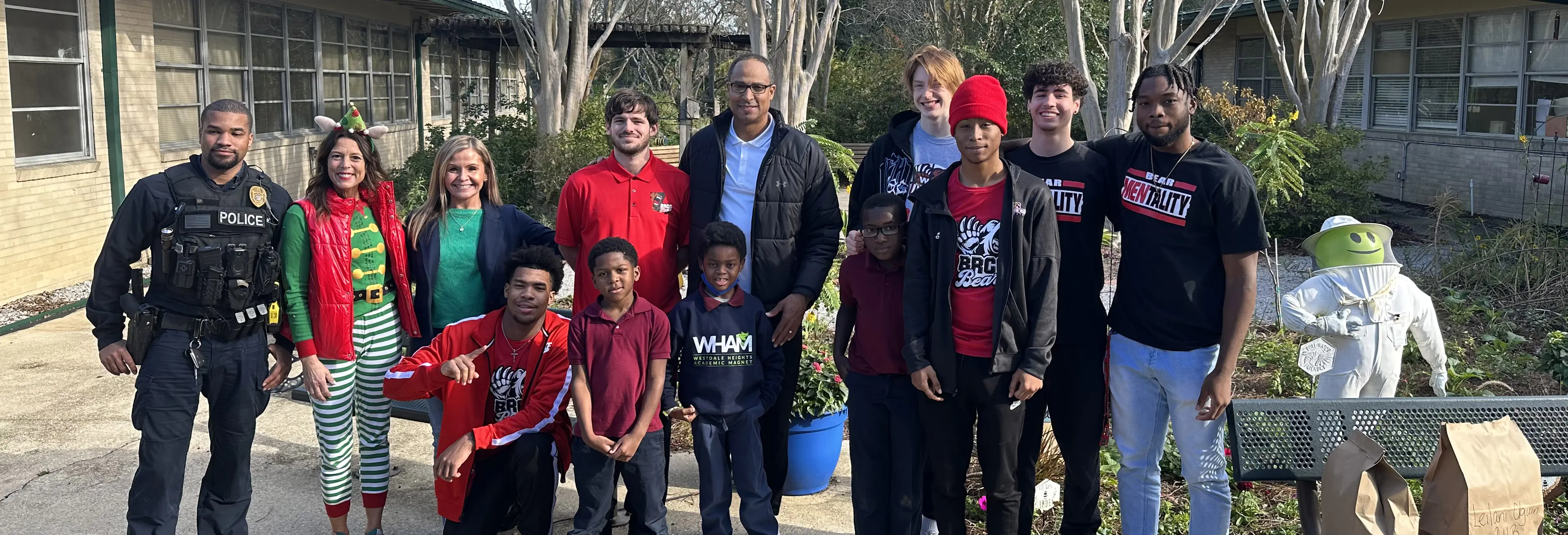 Photos of the BRCC Men’s Basketball Team delivering gifts and interacting with students from Westdale Heights Academic Magnet (WHAM) and Baton Rouge Foreign Language Academy Immersion Magnet (FLAIM).